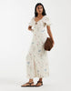 Vero Moda puff sleeve tie front detail maxi dress in cream floral print