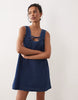 denim scoop neck and back mini dress with bow front in dark mid blue