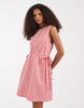 Vero Moda sleeveless bow tie side seersucker mini dress in pink and red gingham print