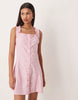 Esmée mini beach dress with ruffle trim in pink gingham
