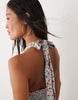 Nobody's Child Petite Lynette deep v halter neck mini dress in blue floral