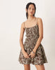 crinkle mini sundress with shirred dropped waist in chocolate shell print