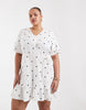 ONLY Curve tie waist mini dress in white polka dots