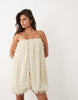 wave textured bubble hem sweetheart neck mini dress in stone