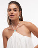 Noughts & Kisses linen blend beaded strap detailing halterneck lace up back mini dress in cream