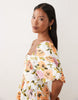 VILA Petite volume sleeve tiered maxi dress in white floral print