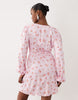 VILA v neck button front long sleeve mini dress in pink floral print