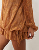 lace mini dress with blouson sleeve and hem detail in tan
