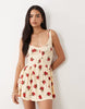button crinkle mini dress in yellow & red floral print