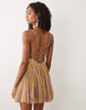 embellished bust cami cut out mini dress in yellow paisley print