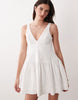 v-neck fit and flare mini sundress in white